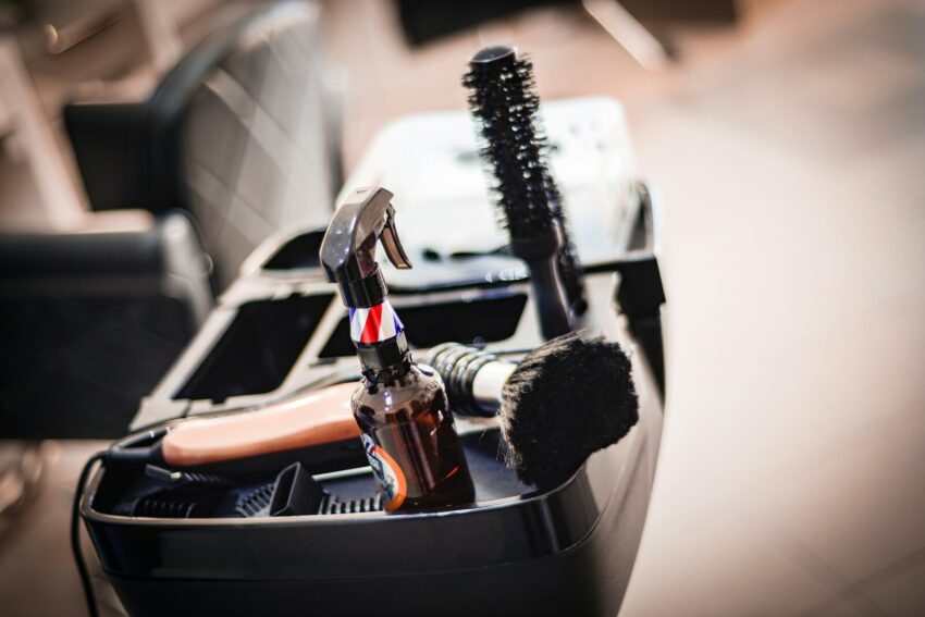 a close up of a brush and other items in a container